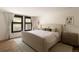 Serene bedroom with a neutral color palette, large bed, and ample natural light at 4121 S Cherry St, Cherry Hills Village, CO 80113