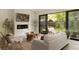Cozy living room featuring a modern fireplace, comfortable seating, and natural light from the sliding glass doors at 4121 S Cherry St, Cherry Hills Village, CO 80113