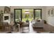 Bright living room with a modern fireplace and sliding glass doors leading to the backyard at 4121 S Cherry St, Cherry Hills Village, CO 80113