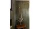Stylish shower featuring olive-green tiling, gold fixtures, and a glass door at 4121 S Cherry St, Cherry Hills Village, CO 80113