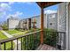 View from a balcony to multiple units with gray siding at 16359 W 10Th Ave # Yy3, Golden, CO 80401