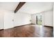 Living room with hardwood floors and a sliding glass door to a balcony at 16359 W 10Th Ave # Yy3, Golden, CO 80401