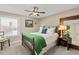 Bedroom featuring a traditional aesthetic, neutral walls, and great natural light at 5440 W Hinsdale Ave, Littleton, CO 80128