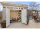 Charming shed with open doors, displaying a colorful interior with plenty of natural light and a bright interior at 5440 W Hinsdale Ave, Littleton, CO 80128