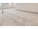 Unfinished basement featuring neutral walls and carpeting, ready for customization at 6863 E 132Nd Pl, Thornton, CO 80602
