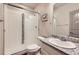 Bathroom featuring granite counters, stand up shower with mosaic tile, and modern finishes at 6863 E 132Nd Pl, Thornton, CO 80602
