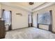 Cozy bedroom featuring plush carpet, two windows with blinds, and neutral decor at 6863 E 132Nd Pl, Thornton, CO 80602
