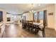 Elegant dining area adjacent to a modern kitchen with stainless steel appliances at 6863 E 132Nd Pl, Thornton, CO 80602