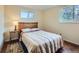 Cozy bedroom with hardwood floors, natural light, and neutral decor at 4257 Graham Ct, Boulder, CO 80305