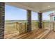 Open deck features sturdy brick supports and beautiful views at 8229 Butte Creek St, Littleton, CO 80125