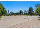 Outdoor basketball court in a park, with trees lining the perimeter at 618 S Franklin St, Denver, CO 80209