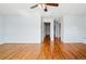 Large bedroom featuring hardwood floors, multiple windows, and plenty of space at 618 S Franklin St, Denver, CO 80209