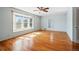 Sunlit bedroom with bay window and a ceiling fan at 618 S Franklin St, Denver, CO 80209