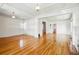 Large living room with hardwood floors, white walls, and plenty of space for entertaining at 618 S Franklin St, Denver, CO 80209