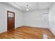 Bright living room with hardwood floors, coffered ceiling, and ample natural light at 618 S Franklin St, Denver, CO 80209