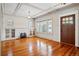 Spacious living room with beautiful hardwood floors, fireplace, and plenty of windows at 618 S Franklin St, Denver, CO 80209