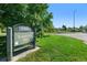 Park entrance with a sign amidst lush greenery and a clear sky at 618 S Franklin St, Denver, CO 80209