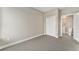 Neutral bedroom with carpet, closet, and en-suite bathroom, ideal for comfortable living and privacy at 2323 Lakeshore Ln # 11, Superior, CO 80027