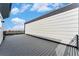 Home exterior featuring large deck with modern railings and composite floor at 2323 Lakeshore Ln # 11, Superior, CO 80027