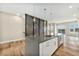 Kitchen island offers stainless steel appliances, stone countertops, and modern finishes at 2323 Lakeshore Ln # 11, Superior, CO 80027