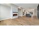 A modern living space features a fireplace, recessed lighting and an open kitchen, perfect for entertaining at 2323 Lakeshore Ln # 11, Superior, CO 80027