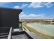 Home exterior featuring a deck with lake views and modern architecture at 2323 Lakeshore Ln # 11, Superior, CO 80027