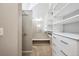 Spacious walk-in closet with custom shelves and drawers provides ample storage space at 345 Harrison St, Denver, CO 80206