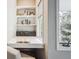 Bright desk area with large window, built-in shelving, and natural light at 345 Harrison St, Denver, CO 80206