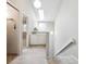 Hallway with skylight providing natural light and built-in storage at 345 Harrison St, Denver, CO 80206