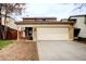 Charming home featuring a spacious two-car garage and a welcoming front porch at 11771 Pennsylvania St, Northglenn, CO 80233