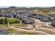 Aerial view of the home showing walking paths and play area, community, and surrounding landscape at 295 Kitselman Dr, Castle Rock, CO 80104