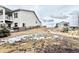 Suburban house exterior shows a community playground and sloping backyard at 295 Kitselman Dr, Castle Rock, CO 80104