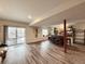 Finished basement area with luxury vinyl plank flooring, custom bar area, and a sliding glass door to the backyard at 295 Kitselman Dr, Castle Rock, CO 80104