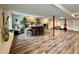 Spacious basement featuring a full bar with ample seating, exercise equipment, and sleek flooring at 295 Kitselman Dr, Castle Rock, CO 80104
