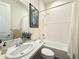 Bright bathroom with shower-tub combination, and vanity with faux marble countertop at 295 Kitselman Dr, Castle Rock, CO 80104