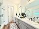 Spacious bathroom with double vanity, modern finishes, and glass enclosed shower at 295 Kitselman Dr, Castle Rock, CO 80104