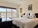 Bright bedroom with a large window and plush bedding, creating a serene atmosphere at 295 Kitselman Dr, Castle Rock, CO 80104