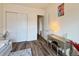 Bedroom with a modern vanity table, a large closet, and wood-style flooring at 295 Kitselman Dr, Castle Rock, CO 80104