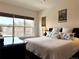 Bedroom featuring natural light with large windows, a ceiling fan, and dark wood furniture at 295 Kitselman Dr, Castle Rock, CO 80104