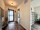 Inviting foyer featuring hardwood floors, stylish decor and an open doorway to the rest of the house at 295 Kitselman Dr, Castle Rock, CO 80104