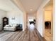 Spacious hallway with hardwood floors connecting the living room and laundry room at 295 Kitselman Dr, Castle Rock, CO 80104