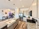 This contemporary kitchen features granite countertops, stainless appliances, and hardwood floors at 295 Kitselman Dr, Castle Rock, CO 80104