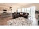 This spacious living room flows seamlessly from the kitchen and dining area, perfect for gatherings at 295 Kitselman Dr, Castle Rock, CO 80104