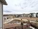 Panoramic view of the neighborhood with well-maintained homes, landscaping, and walking paths at 295 Kitselman Dr, Castle Rock, CO 80104