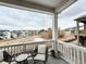 Inviting outdoor porch with views of the neighborhood and natural landscape at 295 Kitselman Dr, Castle Rock, CO 80104