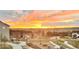 Beautiful sunset view over neighborhood with walking paths and playground, providing a serene living environment at 295 Kitselman Dr, Castle Rock, CO 80104