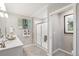 Modern bathroom with double vanity and large walk-in shower at 4410 Cattle Cross Rd, Castle Rock, CO 80104