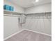 Large walk-in closet with ample shelving and hanging space at 4410 Cattle Cross Rd, Castle Rock, CO 80104