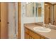 Bathroom featuring a single vanity and shower with glass door at 14910 Williams St, Thornton, CO 80602