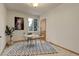 Office space with carpet, window, desk, decor, and neutral color scheme at 14910 Williams St, Thornton, CO 80602